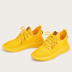 Bright yellow Lace- up Knit Sneakers. NWB.